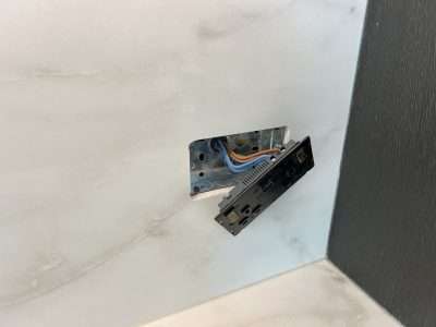 Ceramic Splashback Chip Repair Scaled | Socket removed and chip repaired