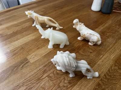 Repair Of Broken Onyx Statuettes Scaled | Repaired statuettes looking like new