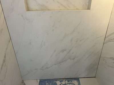 Shower Wall Porcelain Tile Crack Repair Scaled | Hairline crack on left side