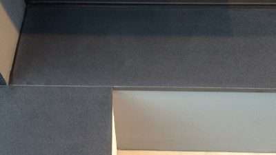 Granite Fireplace Oil Wax Stain Removal | Close up of the stained area after the work is done.