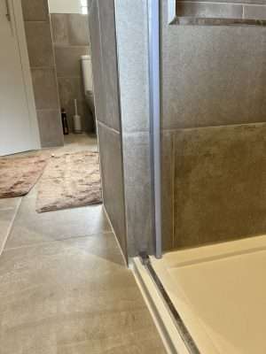 Hole Repairs In Ceramic Shower Tiles Scaled | Bottom hole repaired